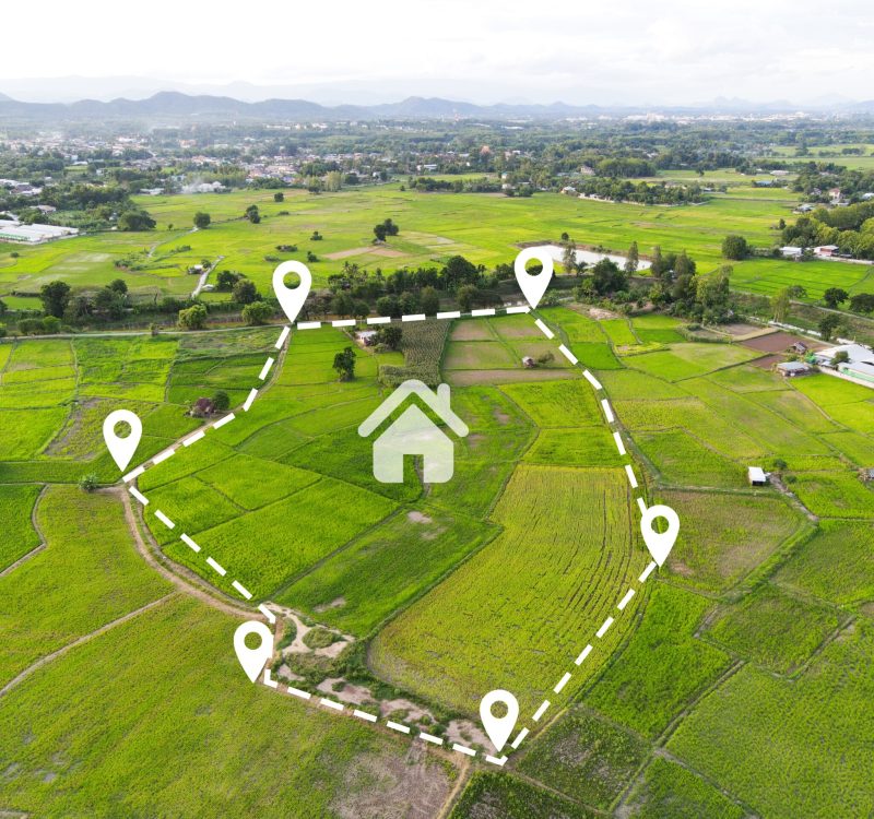 Land plot for building house aerial view, land field with pins, pin location for housing subdivision residential development owned sale rent buy or investment home or house expand the city suburb